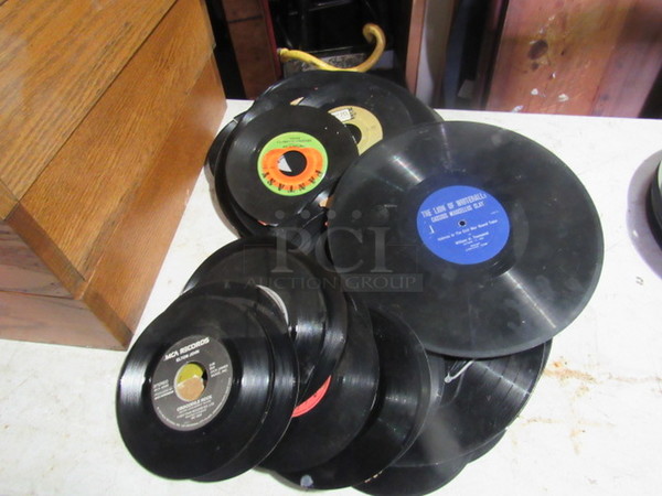 One Lot Of Assorted Vinyl Records, Used As Wall Décor.