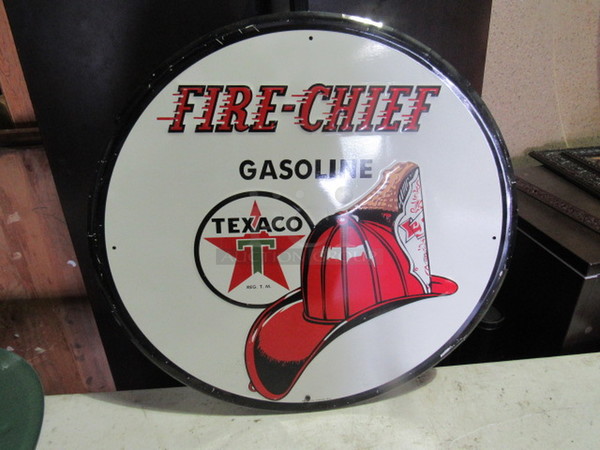 One 23.5 Inch Round Fire Chief Tin Sign.