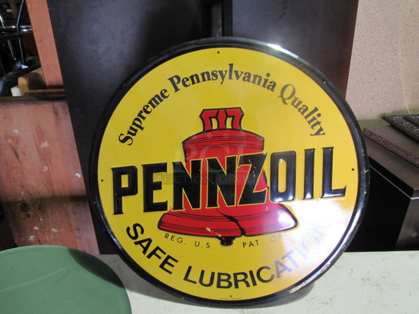 One 23.5 Inch Round Pennzoil Tin Sign.