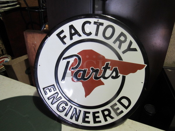 One 23.5 Inch Round Factory Parts Engineered Tin Sign.