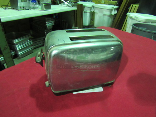 One Vintage 2 Slice Auto Pop Up Toaster. Model# 24-1-2. No plug.