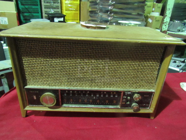 One VINTAGE Zenith AM/FM Radio In A Wooden Cabinet. Model# K731. 35 Watt. 117 Volt.