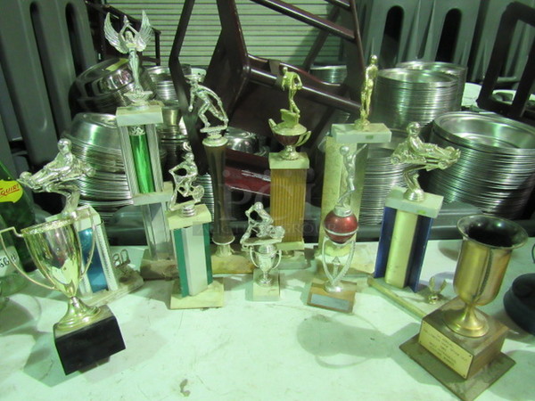 One Lot Of 11 Assorted Vintage Trophies.
