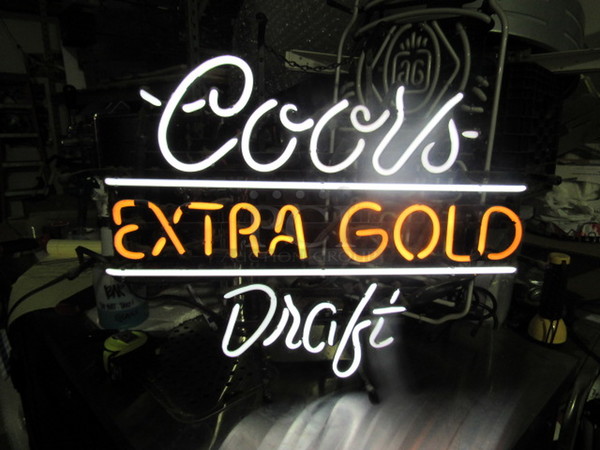 One Coors Extra Gold Draft Neon.