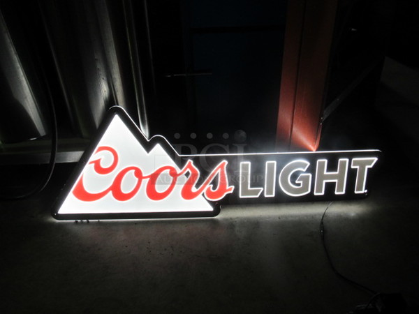 One Coors Light Electric Sign.
