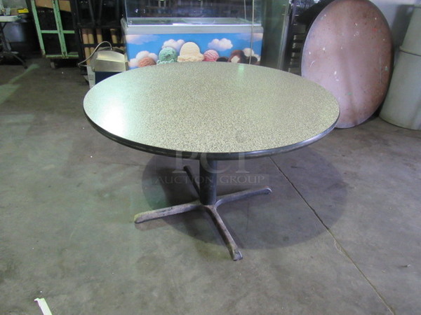 One Round Granite Look Laminate Booth Table Top On A Pedestal Base. 48X48X30