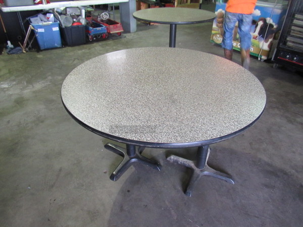 One Round Granite Look Laminate Booth Table Top On A Dual Pedestal Base. 48X48X30