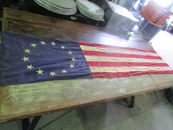 One 88X16 American Flag With 13 Stars. torn see pic.