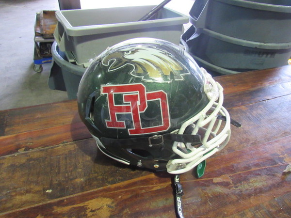 One Riddell Football Helmet With under Armor Strap.