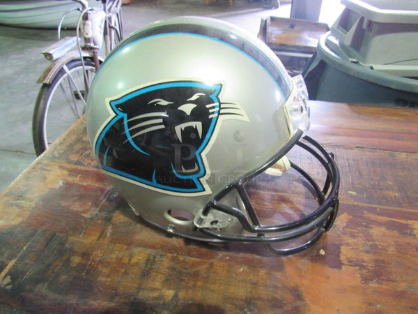 One Carolina Panthers Helmet Signed By Jerry Richardson.