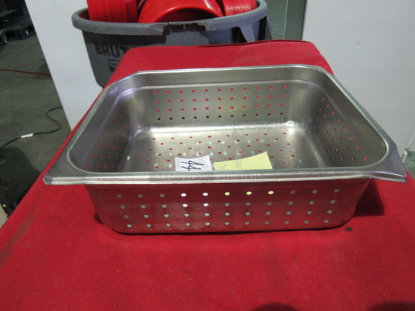 One 1/2 Size 4 Inch Deep Perforated Hotel Pan. 