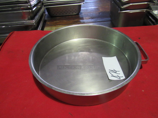 One 13 Inch Stainless Steel Pan.