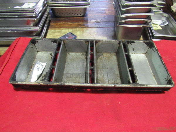 One 22X10 Commercial 4 Hole Loaf Pan.