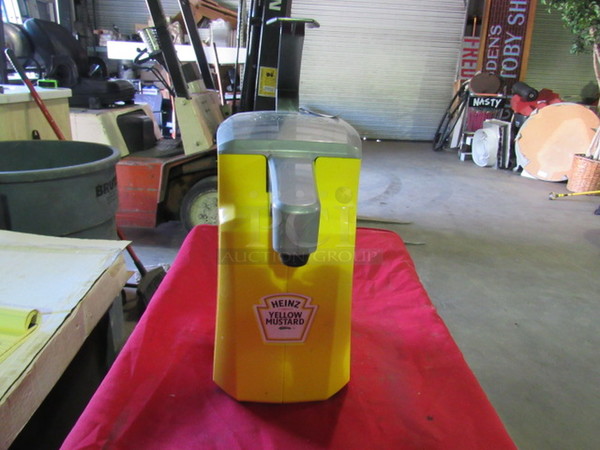 One Heinz Mustard Pump Station Condiment Dispenser.