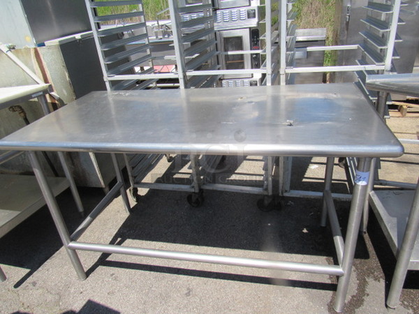 One Stainless Steel Table. Holes In Top See Pic. 60X30X35