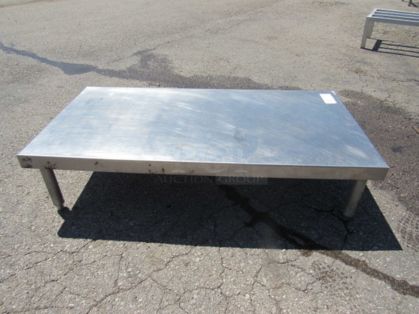 One Stainless Steel Table. 48X24X12