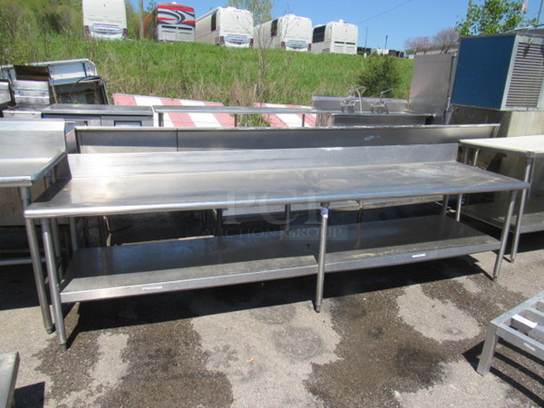 One Stainless Steel Table With Stainless Under Shelf And Back Splash. 114X31X36