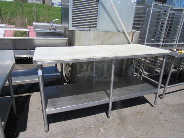One Stainless Steel Table With Stainless Under Shelf And Cutting Board Tops. 72X30X38
