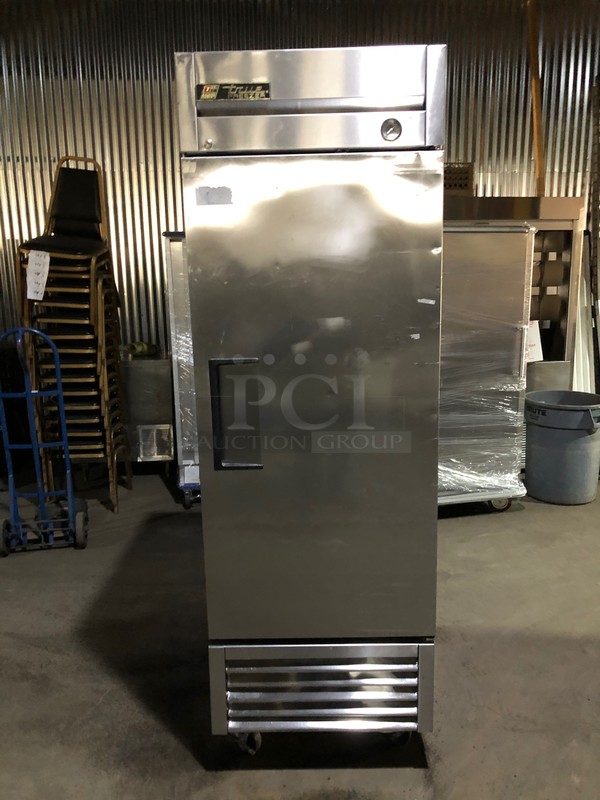 True Commercial Single Door Reach In Freezer! With Poly Coated Racks! All Stainless Steel! Model T23F Serial 7824669! 115V 1Phase! On Commercial Casters!