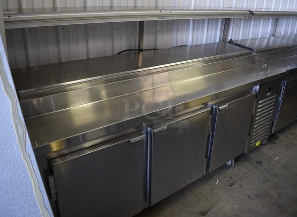 BEAUTIFUL! 2016 Kairak Model KBP-91S Stainless Steel Commercial Pizza Prep Table w/ Overshelf on Commercial Casters. 91x32x57. Cannot Test Due To Plug Style But Unit Was Working When Removed