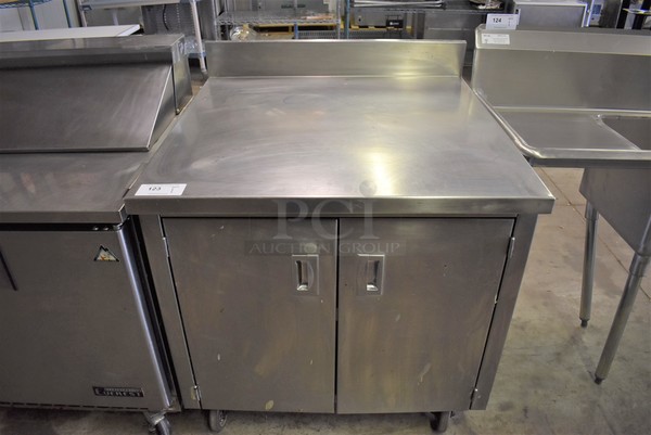 Stainless Steel Commercial Counter w/ Backsplash and 2 Doors on Commercial Casters. 36x35x42