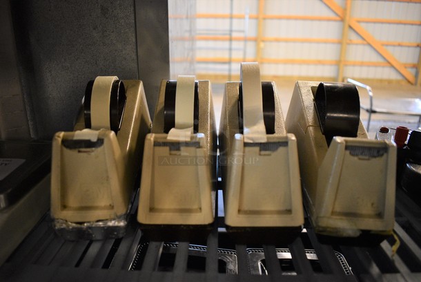 4 Poly Tan 3M Tape Dispensers. 3.5x9.5x4.5. 4 Times Your Bid! - Image 1 of 4