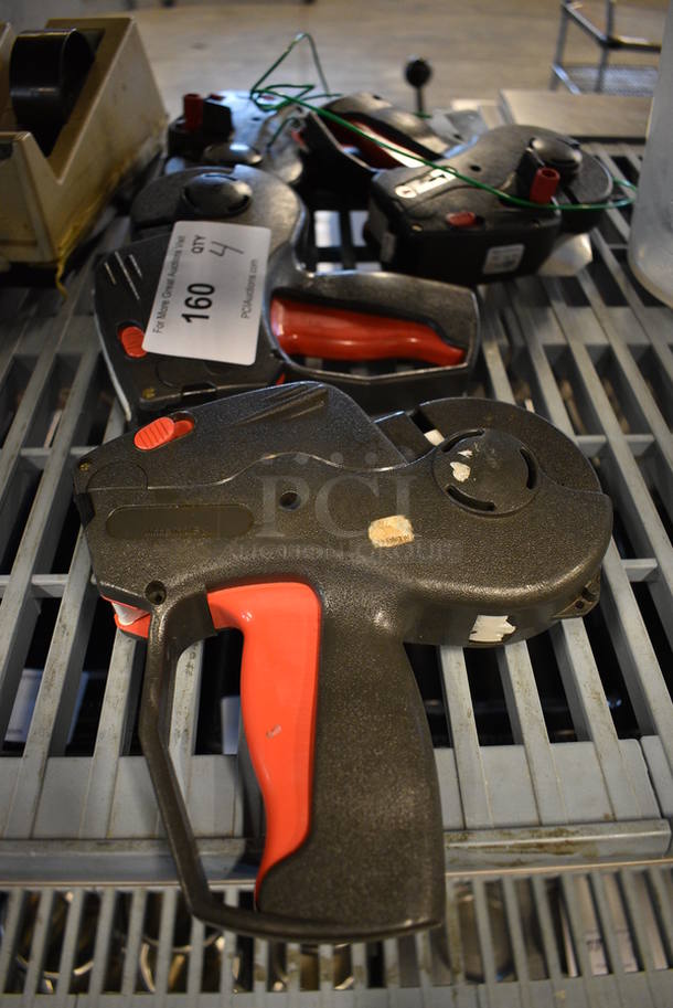 4 Black and Red Poly Price Guns. 2.5x8x8. 4 Times Your Bid! - Image 1 of 3