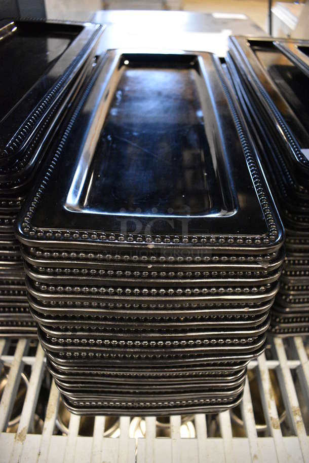 19 Black Poly Trays. 7x17x1. 19 Times Your Bid! - Image 1 of 4