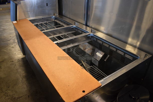 WOW! Delfield Stainless Steel Commercial Prep Table w/ Cutting Board on Commercial Casters. 72x35x36. Tested and Working! - Image 2 of 7