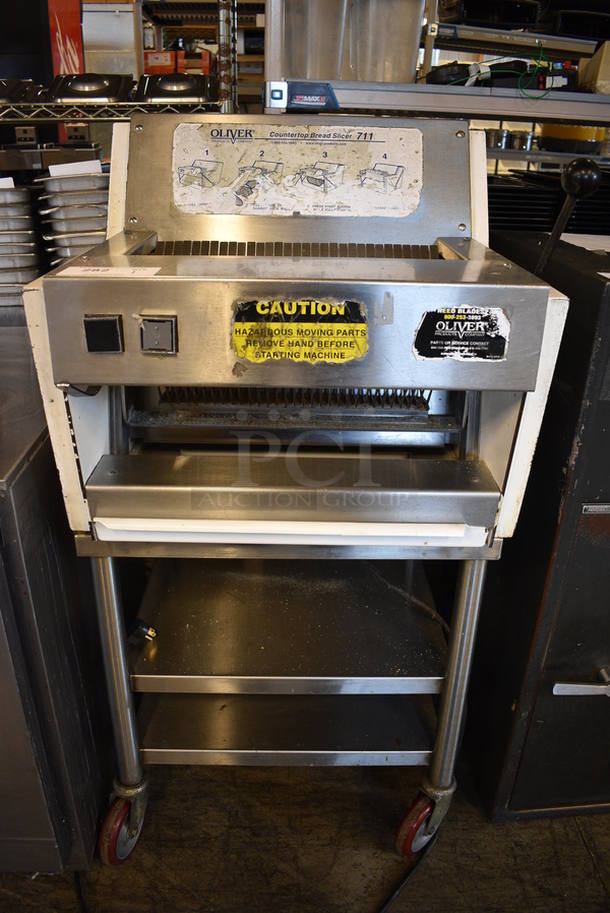 AWESOME! Oliver Model 711 Stainless Steel Commercial Bread Loaf Slicer on Stainless Steel Commercial Equipment Stand w/ Commercial Casters. 115 Volts, 1 Phase. 25x29x48. Tested and Working! - Image 2 of 7