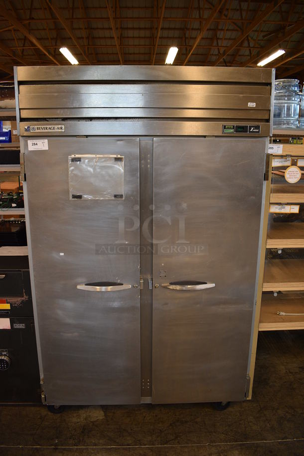 GREAT! Beverage Air Model ER48-1AS Stainless Steel Commercial 2 Door Reach In Cooler on Commercial Casters. 115 Volts, 1 Phase. 52x33x83.5. Tested and Powers On But Does Not Get Cold