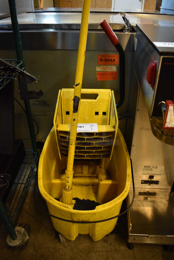 Yellow Poly Mop Bucket w/ Wringing Attachment and Mop on Commercial Casters. 16x23x37