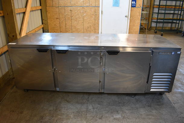 SWEET! Beverage Air Model UCR93A-09-003 Stainless Steel Commercial 3 Door Work Top Cooler on Commercial Casters. 115 Volts, 1 Phase. 93x33x32. Tested and Powers On But Does Not Get Cold