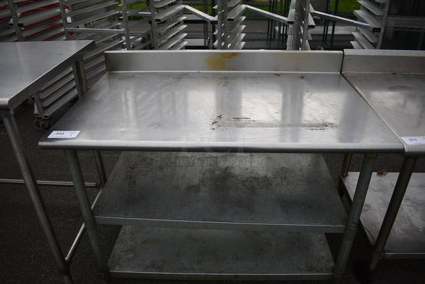 Stainless Steel Table w/ Backsplash and 2 Metal Undershelves. 48x30x38