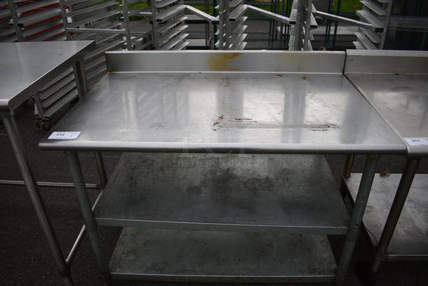 Stainless Steel Table w/ Backsplash and 2 Metal Undershelves. 48x30x38 - Image 1 of 3
