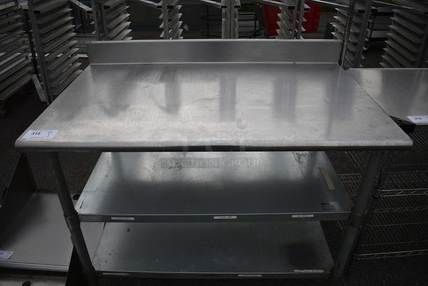 Stainless Steel Table w/ Backsplash and 2 Metal Undershelves. 48x30x39