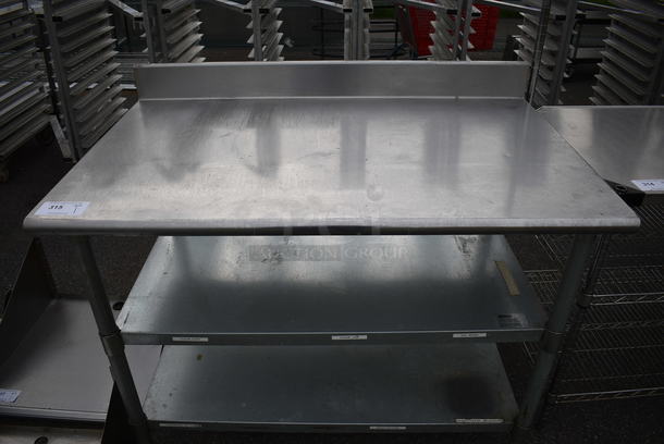 Stainless Steel Table w/ Backsplash and 2 Metal Undershelves. 48x30x39 - Image 1 of 4
