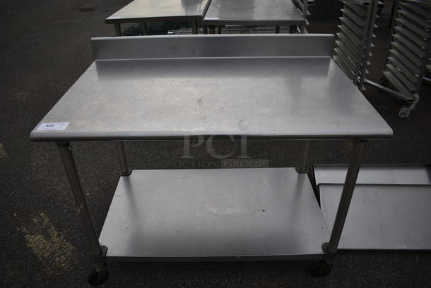 Stainless Steel Table w/ Backsplash and Metal Undershelf on Commercial Casters. 48x30x39