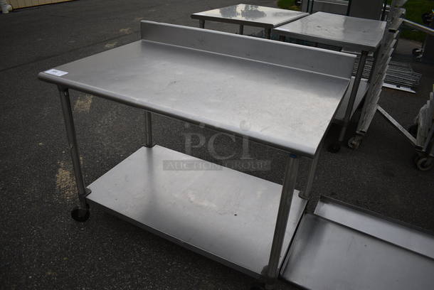Stainless Steel Table w/ Backsplash and Metal Undershelf on Commercial Casters. 48x30x39 - Image 2 of 4