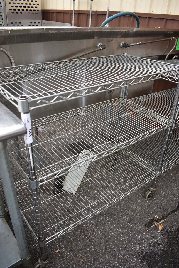 Chrome Finish 3 Tier Shelving Unit on Commercial Casters. 36x18x38. BUYER MUST DISMANTLE. PCI CANNOT  DISMANTLE FOR SHIPPING. PLEASE CONSIDER FREIGHT CHARGES. - Image 1 of 2