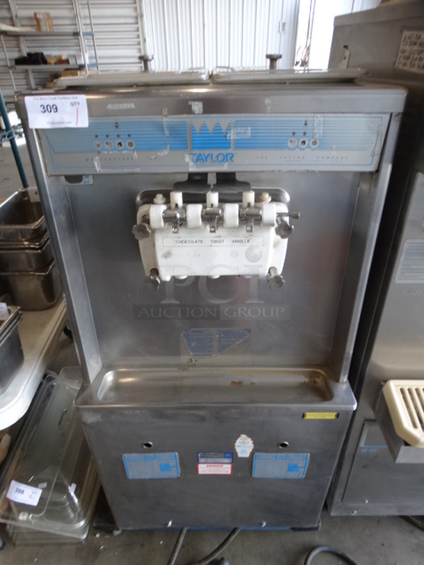 SWEET! Taylor Model 754-27 Stainless Steel Commercial Floor Style Air Cooled 2 Flavor w/ Twist Soft Serve Ice Cream Machine. 208-230 Volts, 1 Phase. 26x33x51