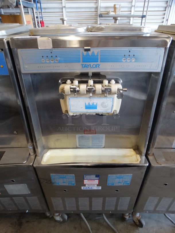 SWEET! Taylor Model 754-33 Stainless Steel Commercial Floor Style Water Cooled 2 Flavor w/ Twist Soft Serve Ice Cream Machine on Commercial Casters. 208-230 Volts, 3 Phase. 26x33x59
