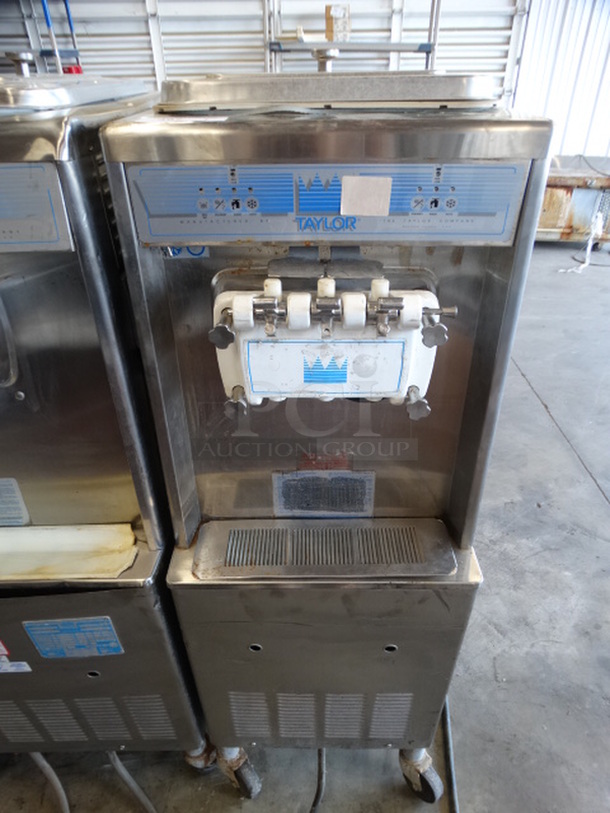 SWEET! Taylor Stainless Steel Commercial Floor Style Air Cooled 2 Flavor w/ Twist Soft Serve Ice Cream Machine on Commercial Casters. 20x33x59