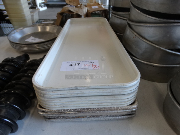 11 Long Trays; 7 Poly and 4 Metal. Includes 9x25.5x1. 11 Times Your Bid!