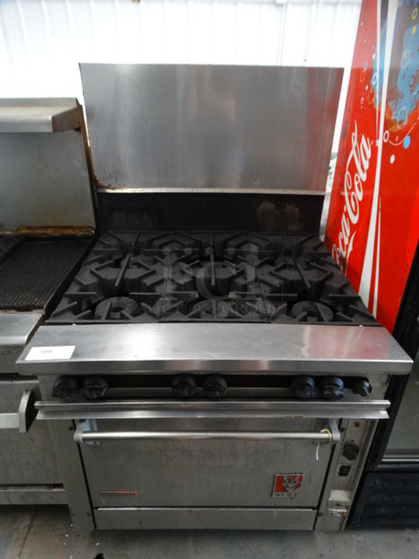 WOW! Wolf Stainless Steel Commercial Gas Powered 6 Burner Range w/ Lower Oven and Backsplash. 36x38x61