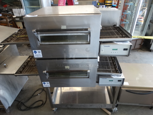 2 GORGEOUS! Lincoln Impinger Model 1132-002-U-K1841 Stainless Steel Commercial Electric Powered Conveyor Pizza Ovens on Commercial Casters. 208 Volts, 3 Phase. 70x38x63. 2 Times Your Bid!