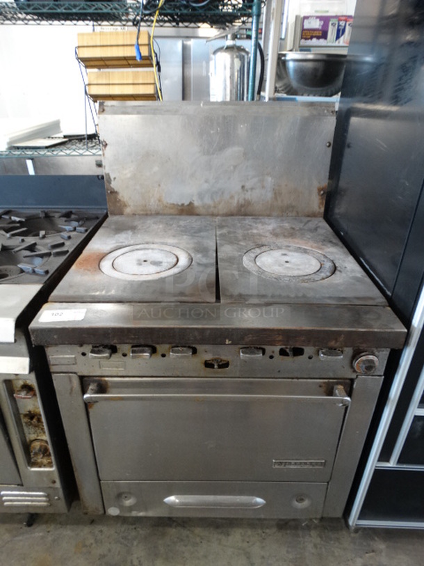 GREAT! Garland Stainless Steel Commercial Gas Powered 2 Burner Range w/ Lower Oven and Backsplash. 34x39x53