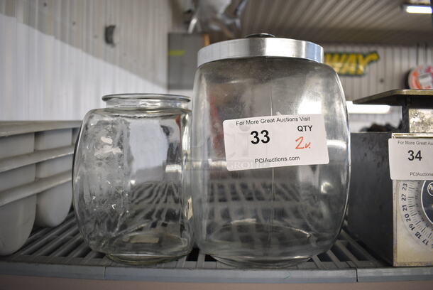 2 Glass Jars w/ 1 Lid. Includes 7x10x12. 2 Times Your Bid!