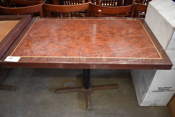 Brown Table on Black Metal Table Base. Stock Picture - Cosmetic Condition May Vary. 46x28x30