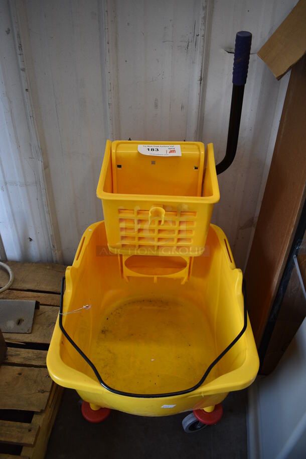 Yellow Poly Mop Bucket w/ Wringing Attachment on Casters. 16x22x35